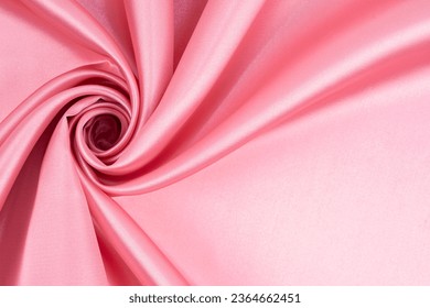 Rose gold fabric texture background, detail of silk or linen pattern.