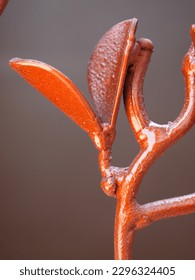 rose gold painted wrought iron artwork