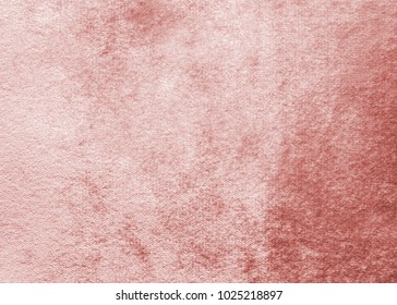 Rose gold pink velvet background or velour flannel texture made of cotton or wool with soft fluffy velvety satin fabric cloth metallic color material   