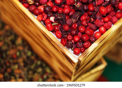 Rose Hips In Wooden Boxes. Export And Trade Of Raw Materials For Pharmaceutical Companies. Close-up