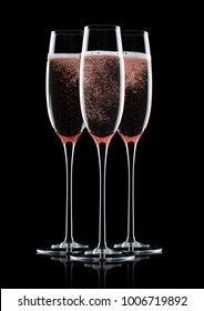 Rose Pink Champagne Glasses With Bubbles On Black Background With Reflection