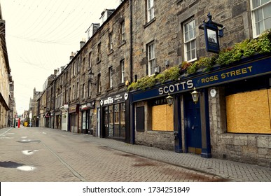 Rose Street In Edinburgh, Famous Lane Of Pubs And Bars Boarded Up And Deserted Street During The Coronovirus Pandemic In UK. Edinburgh City Centre, Scotland UK. May 2020