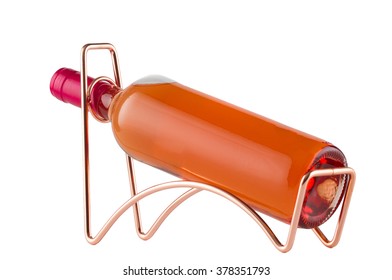 Rose Wine Bottle  On A Metal Wine Rack Isolated On White