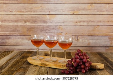 Rose Wine Flight With Grapes