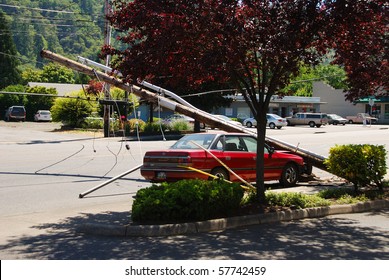 ROSEBURG, OREGON - JULY 15: Single Motor Vehicle Accident That Hit A Power Pole Causing A Area Wide Power Outage And Closed Down Harvard Avenue. July 15, 2010 In Roseburg, OR