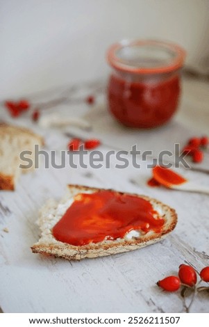 Rosehip jam spread on bread