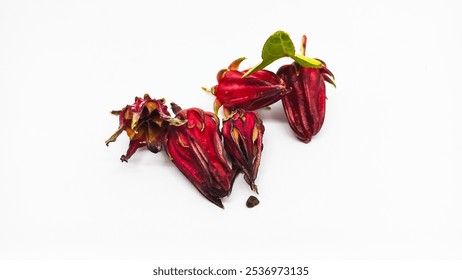 Rosella flowers in the drying process to be processed into herbal medicine ingredients brewed like tea - Powered by Shutterstock