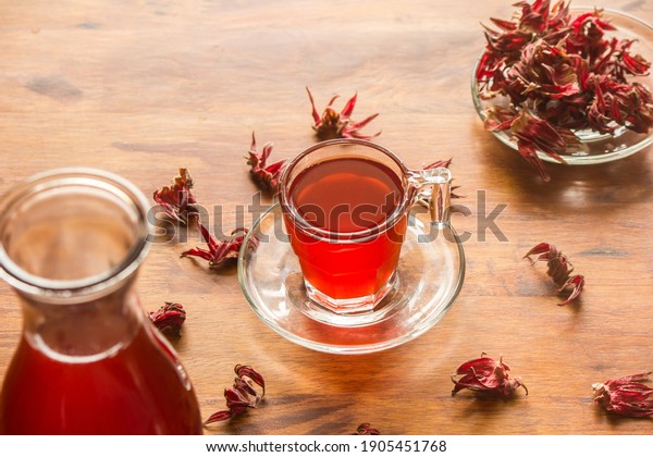 Roselle juice has a\
sour taste and is boiled with water. Add sugar and a little salt.\
Drink for good health