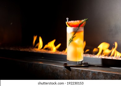 Rosemary cocktail on a fireplace - Powered by Shutterstock