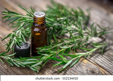 Rosemary essential oil and fresh rosemary 
