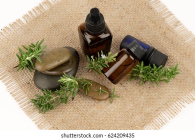 Rosemary; Herbs have medicinal properties (essential oil in bottles)
