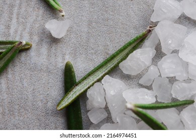 Rosemary And Salt Granules. Popular Flavour Combination Used In Cooking And Seasoning 