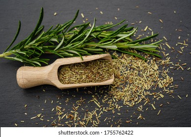Rosemary Salvia Rosmarinus And A Wooden Spoon