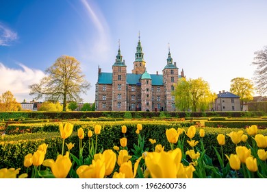 Rosenborg Castle Gardens in Copenhagen, Denmark with blue sky