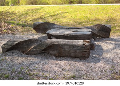 Rosenheim, Germany - 25.April 2021: Artistic wooden table set in a park