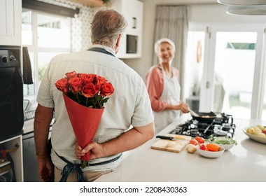 Roses, gift and senior couple love flowers to celebrate their marriage anniversary in a romantic way at home. Romance, happy and old man giving wife a bouquet for a happy birthday surprise present - Powered by Shutterstock