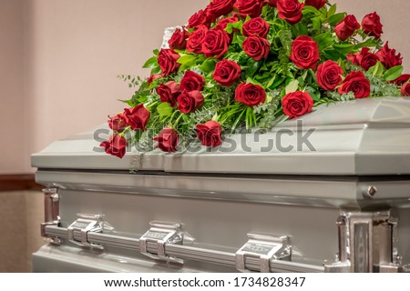 Roses on Top of Funeral Casket