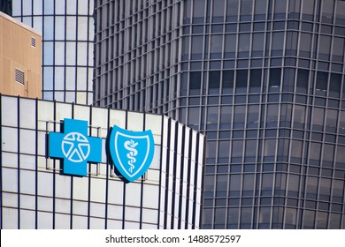 Roseville, MI / USA - August 20, 2019: Logo Of Blue Cross And Blue Shield On Skyscraper