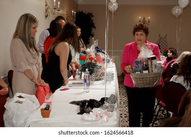 Roseville, Michigan - May, 2014: Woman With Bridal Shower Game Winnings