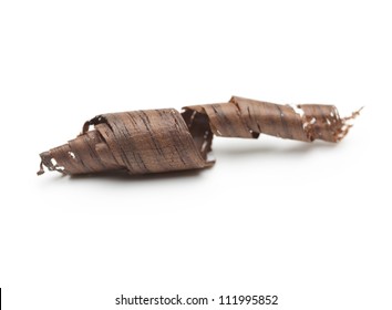Rosewood (dalbergia) wood curl or wood shaving, isolated on white.