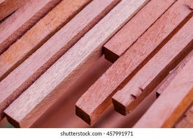 Rosewood Logs Lay Stacked Along The Street Waiting To Make Furniture