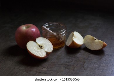 Rosh Hashanah Apples And Honey On Rustic Old World Table