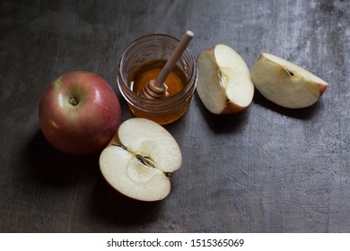 Rosh Hashanah Apples And Honey On Rustic Old World Table