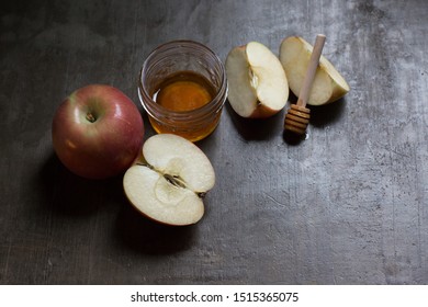 Rosh Hashanah Apples And Honey On Rustic Old World Table