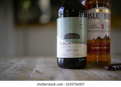 Roskhill, Isle of Skye, UK - 05.07.2022: A bottle of Isle of Skye whisky and Blackhouse in the Hame Hotel's Honesty Bar.