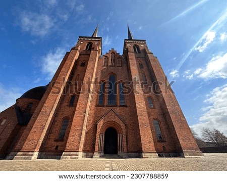 Roskilde Cathedral, historical building, architecture, religion, denmark, copenhagen, gorgeous building, building with red stones, high building, rising up to the sky, bottom up angle  