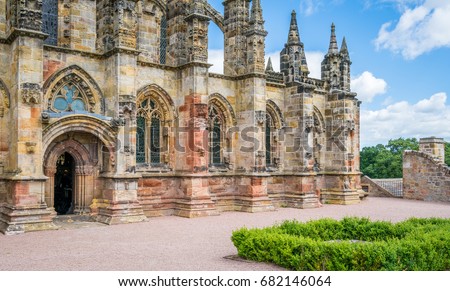 Rosslyn Chapel on a sunny summer day, located at the village of Roslin, Midlothian, Scotland. June-25-2017