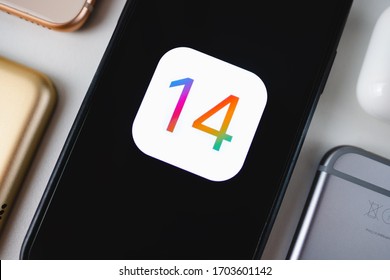 ROSTOV-ON-DON / RUSSIA - April 11 2020: iPhone with iOS 14 logo on the screen close up, new operating system 2020 on apple devices 