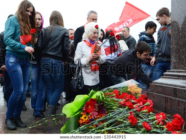 ROSTOV-ON-DON, RUSSIA - APRIL 11: The rally,\
placing flowers  International automobile race Ã?Â«Our Great\
VictoryÃ?Â» in honor of the Day of Victory in the WWII, April 11,\
2013 in Rostov-on-Don,\
Russia