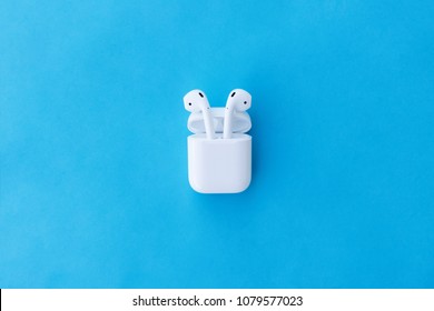 ROSTOV-ON-DON, RUSSIA - APRIL 28, 2018: Apple AirPods wireless Bluetooth headphones and charging case for  Apple iPhone. New Apple Earpods Airpods in box. 