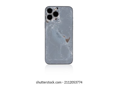 Rostov-on-Don, Russia - January 2022. Apple Iphone Pro Broken On A White Background. Broken Phone Back Cover