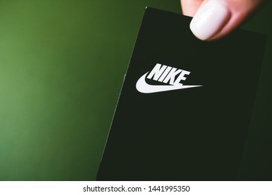 ROSTOV-ON-DON / RUSSIA - July 4 2019: Closeup Of Nike Logo Label On Green Background. Nike Logo. Nike Is A Global Sports Clothes