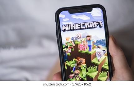 ROSTOV-ON-DON / RUSSIA - May 10 2020: Minecraft Game On The IPhone Screen In Hand.