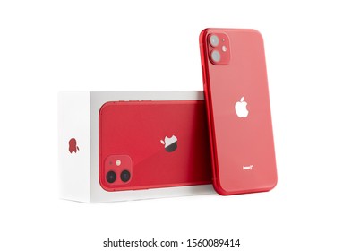 Rostov-on-Don, Russia - November 2019. Apple iPhone 11 PRODUCT RED on a white background.  Close-up of a new smartphone from Apple and a box from it.