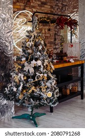 Rostov-on-Don, Russia - November 22, 2021: Christmas Tree Decorated With Vintage Wooden, Glass And Fabric Toys In A Loft Apartment