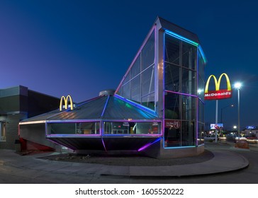 ROSWELL, NEW MEXICO, USA - NOVEMBER 22, 2019: Flying Saucer UFO McDonald's at night on Main Street in downtown Roswell