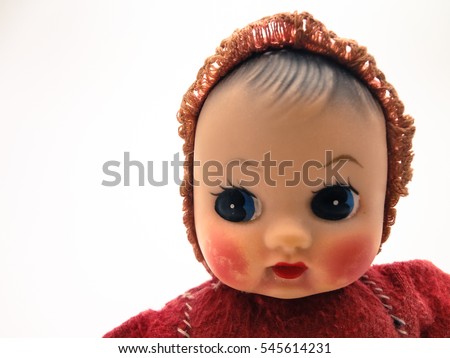 Rosy cheeks baby doll on white background 