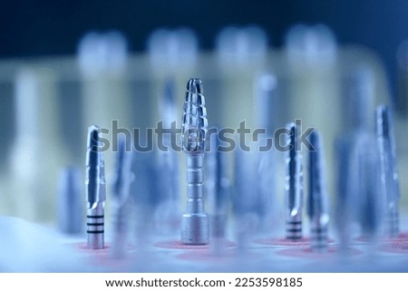 Rotary Dentistry Tools. Dental tools, tongs of various shapes. drill, dentist, dentistry, medical background. Shallow depth of field