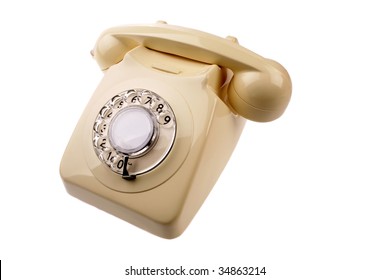 Rotary dial telephone on white