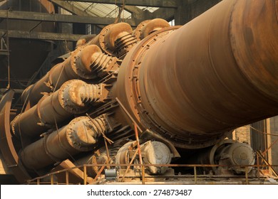 rotary kiln in a cement plant, closeup of photo