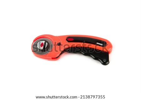 Rotary knife for patchwork isolated on white background.