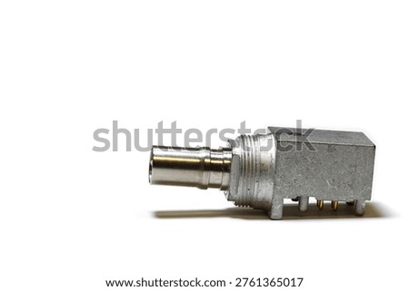 Rotary potentiometer, an electronic component, isolated on a white background