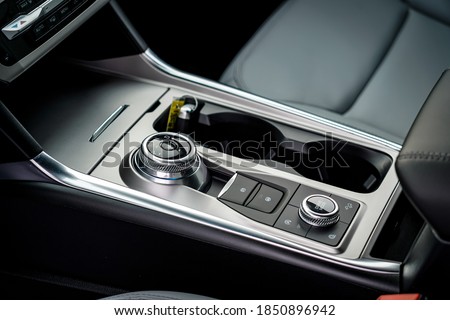 Rotary shift dial and center console in a new vehicle