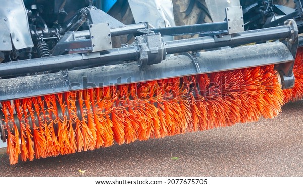 Rotating brush for sweeping and cleaning streets\
behind a wheeled tractor. The universal road cleaning brush\
equipment is designed for cleaning the roadway and industrial areas\
from sand and debris.