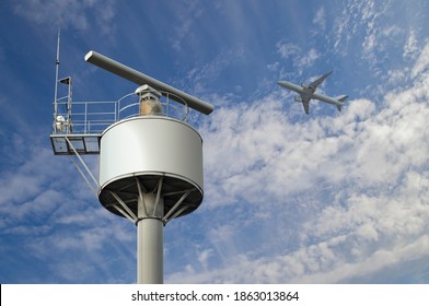 Rotating coastal radar surveillance station under the cloudy summer sky by the sea catching an airplane flying in the air space