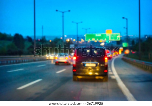 Rotating\
illuminated road shot with blurred\
focus
